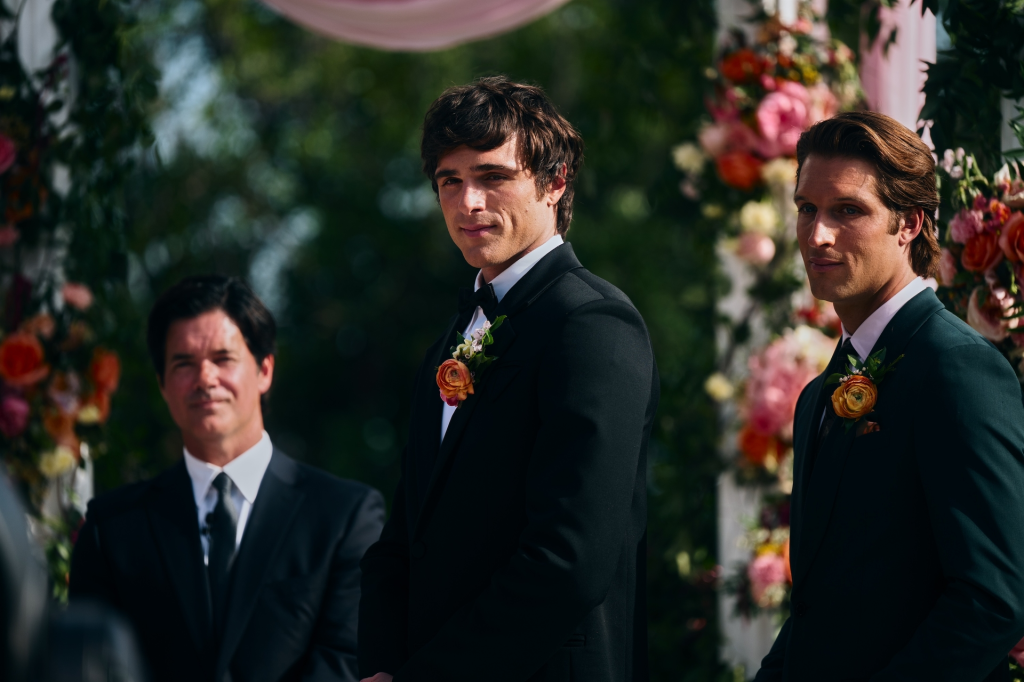Jacob Elordi in a black tuxedo with a peach flower boutonnière in Euphoria Season 3.