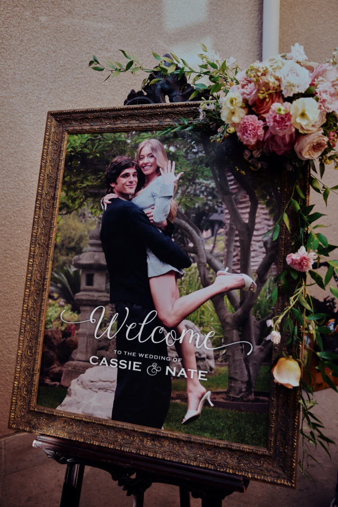 Welcome sign to the wedding of Cassie and Nate, featuring Jacob Elordi and Sydney Sweeney.