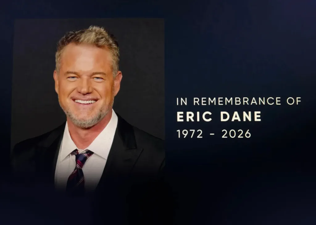 Tribute card for Eric Dane with a smiling photo of him in a suit and the text "In Remembrance of Eric Dane 1972 - 2026."