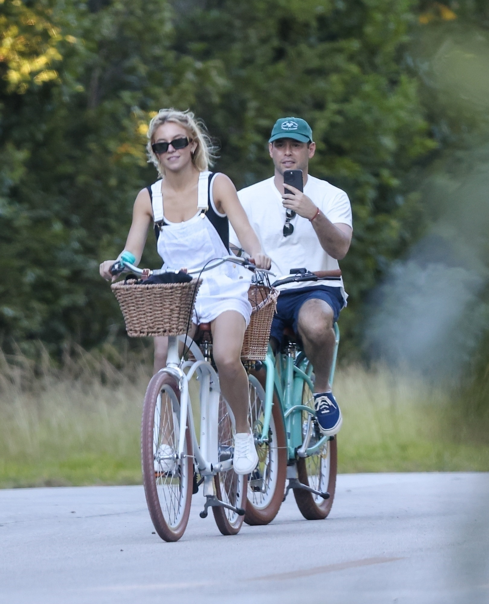 Sydney Sweeney and Scooter Braun bike together.