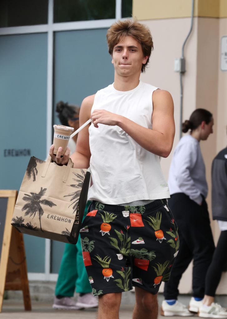Jayden Federline holding an Erewhon grocery bag and drink.