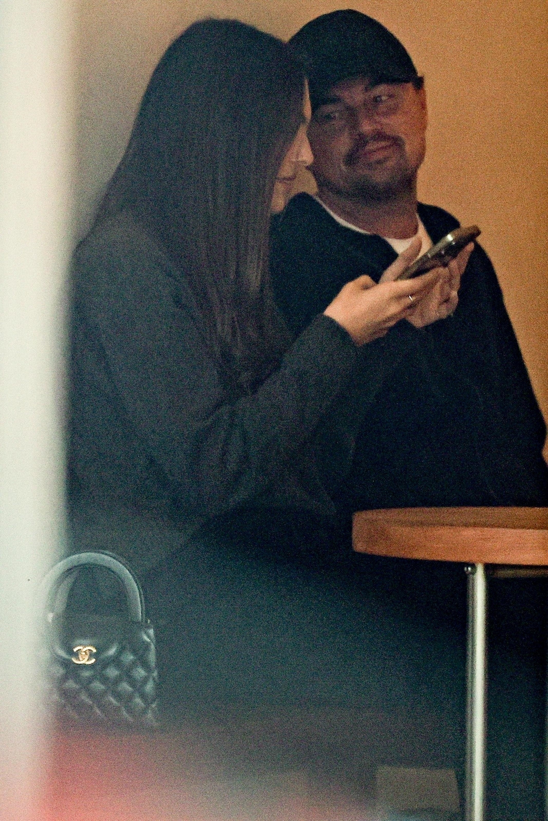 Leonardo DiCaprio and Vittoria Ceretti share a kiss while shopping in Los Angeles.