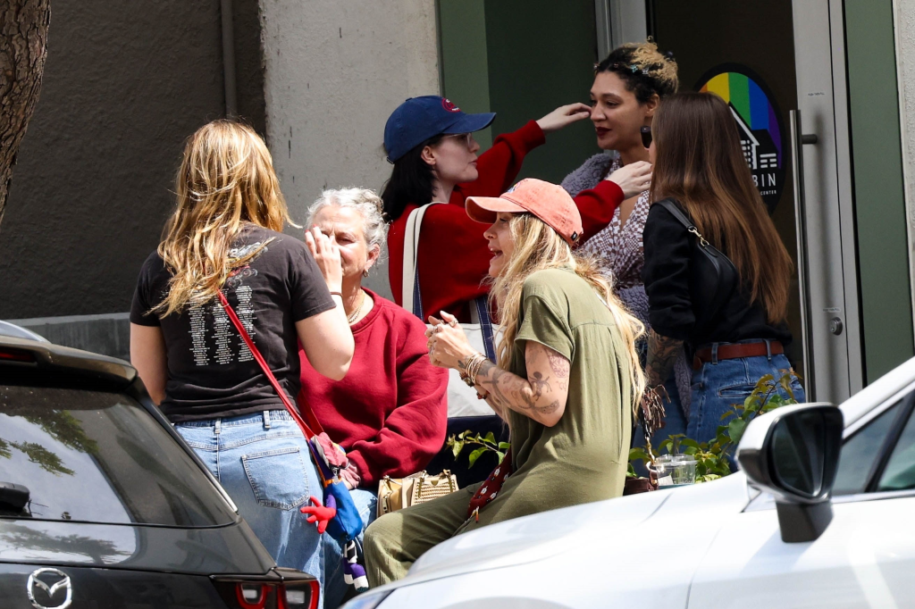 Paris Jackson smoking with a friend in West Hollywood.