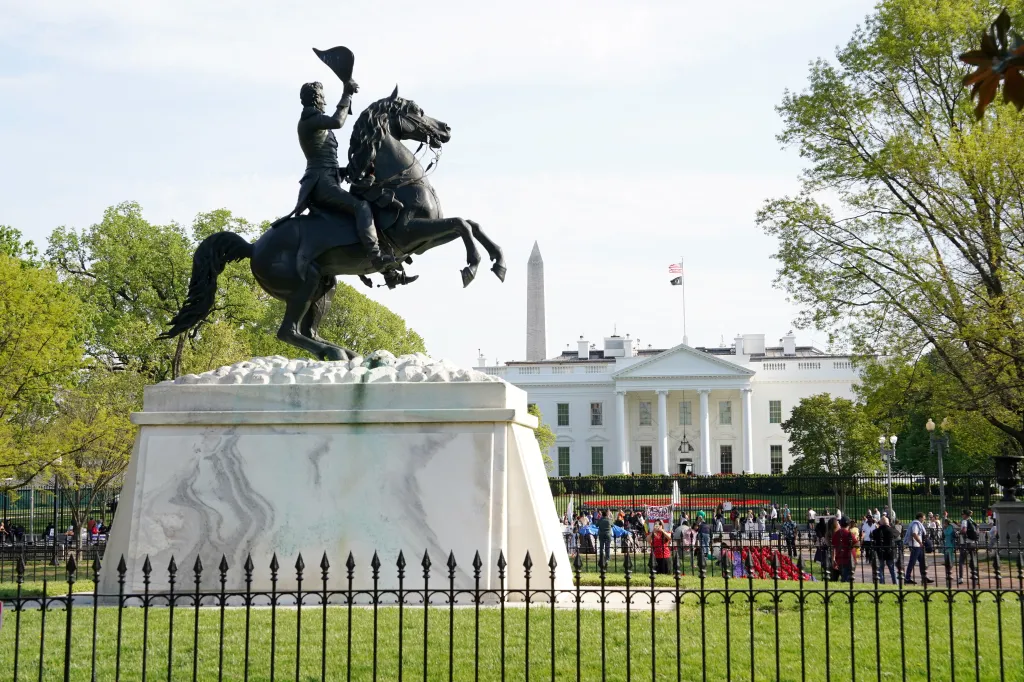 The White House North Portico and Lawn in Washington, D.C. with the General Andrew Jackson statue in the foreground and the Washington Monument in the background.