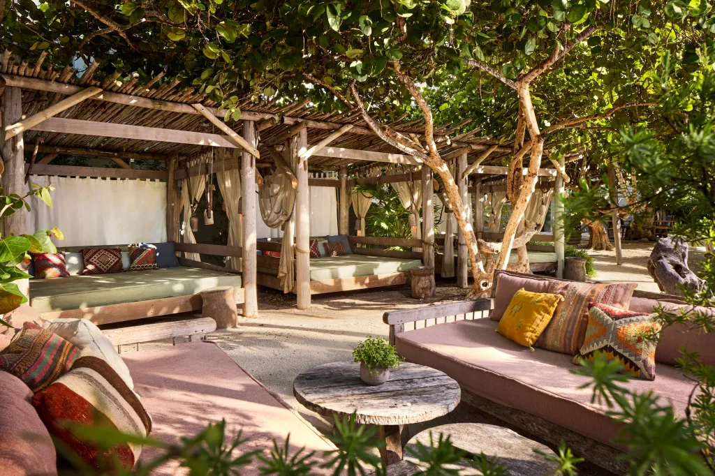 Tala Beach at the 1 Hotel South Beach, featuring cabanas and outdoor seating.