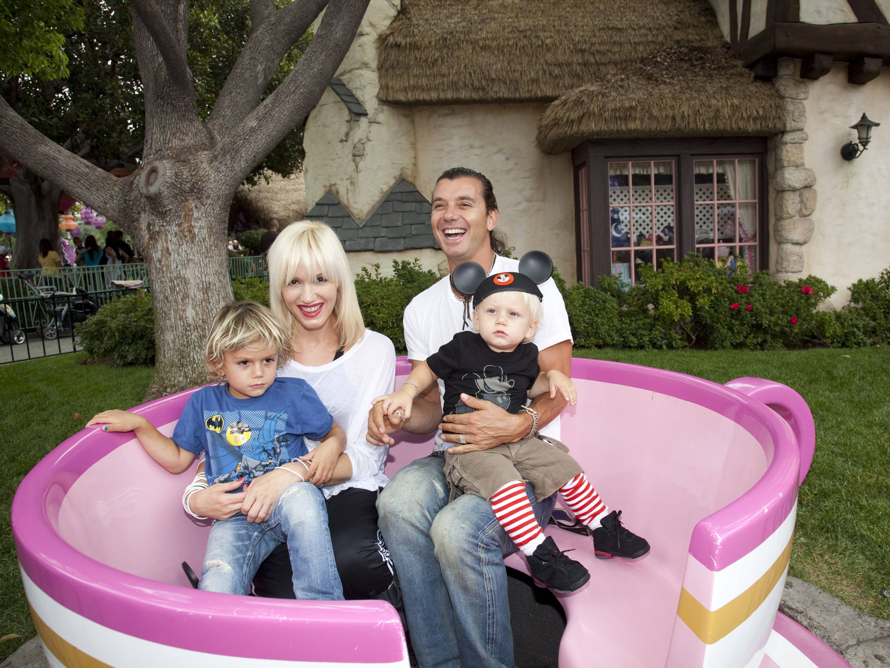 Gwen Stefani and Gavin Rossdale with their children Kingston and Zuma at the Mad Tea Party attraction at Disneyland.