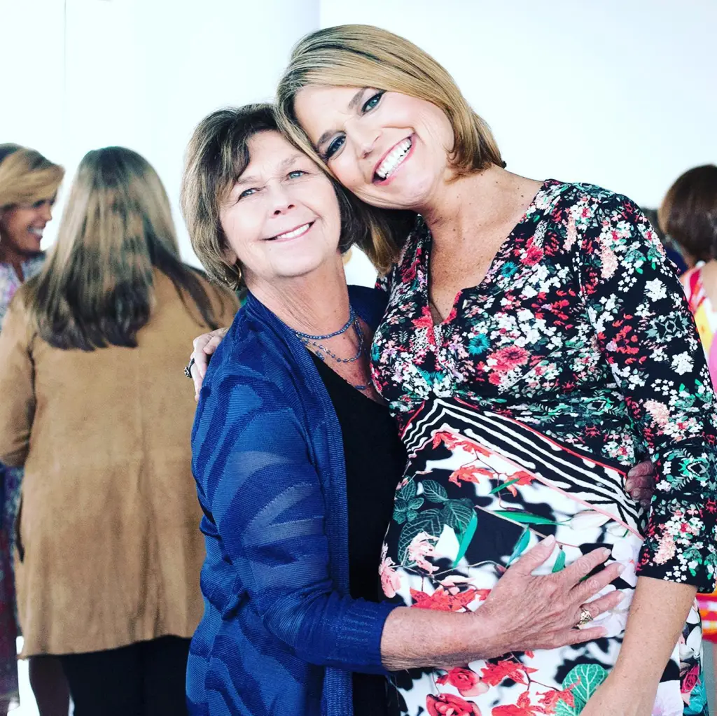 Savannah Guthrie embracing her mother, Nancy Guthrie, and cradling her pregnant belly.