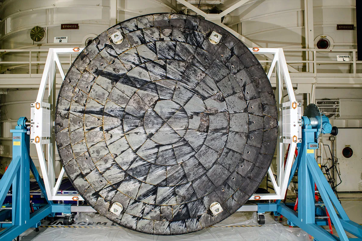 This photo shows the charred heat shield of the Orion capsule after NASA's uncrewed Artemis 1 mission.