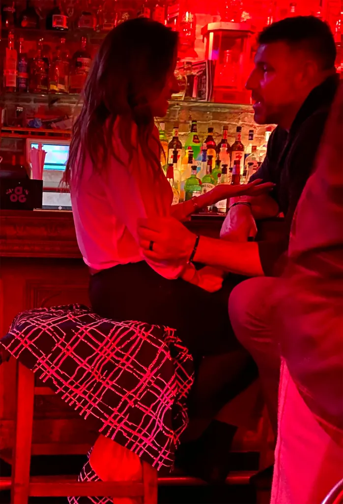 Mike Vrabel and Dianna Russini kissing and chatting at Tribeca Tavern.