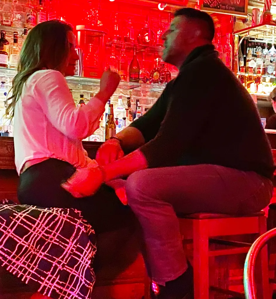 Mike Vrabel and Dianna Russini chatting at Tribeca Tavern.