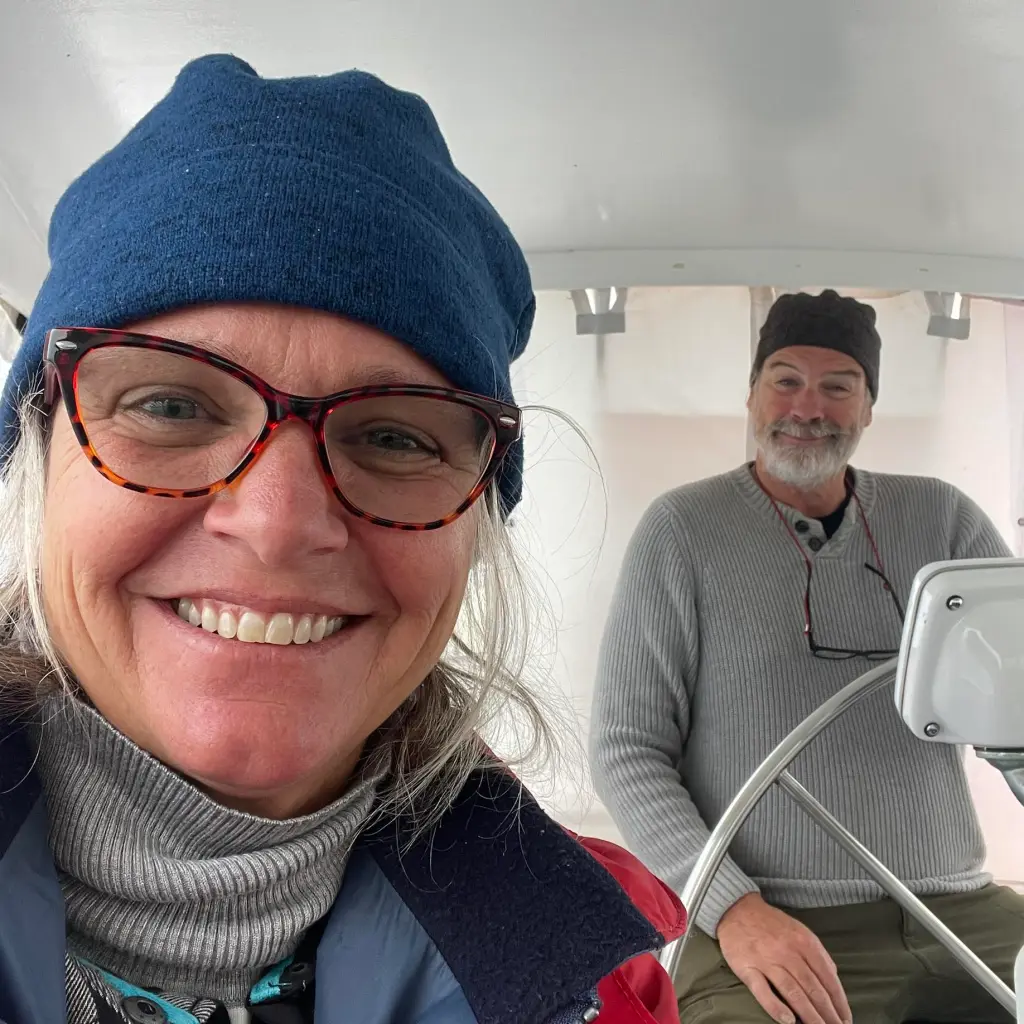 Lynette Hooker and her husband, Brian Hooker, on a boat.