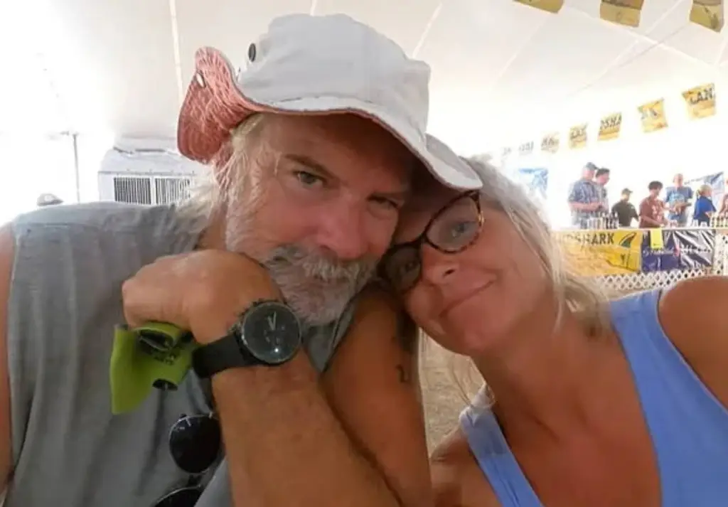 Husband Brian Hooker and missing boater Lynette Hooker posing for a photo.