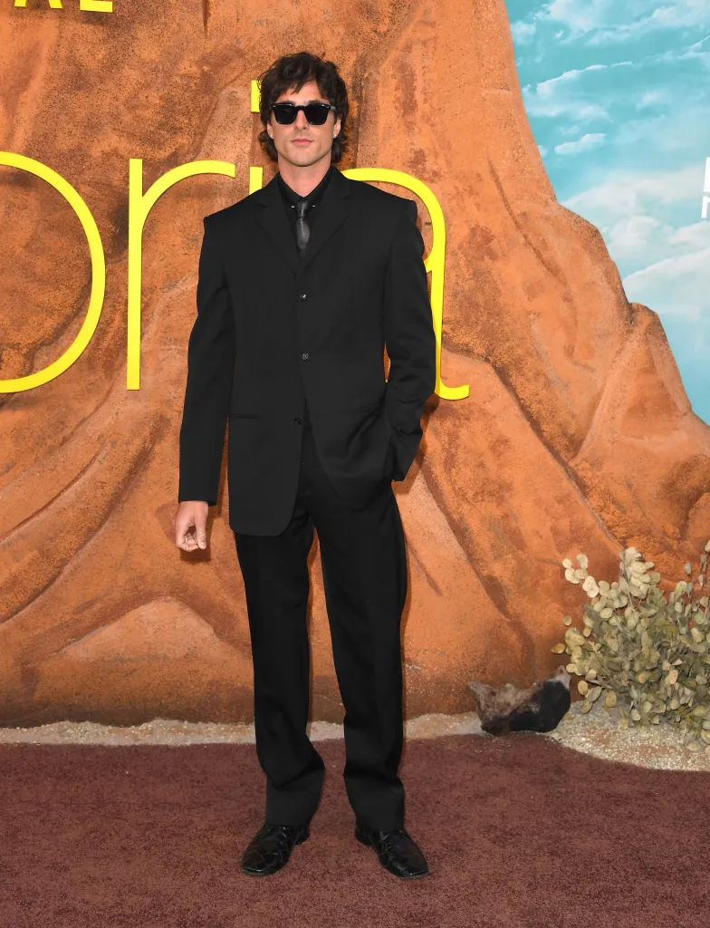 Jacob Elordi in a black suit and sunglasses at the "Euphoria" Season 3 premiere.