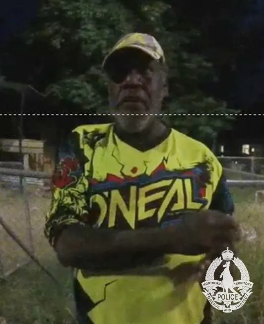 Jefferson Lewis, a recently released inmate, wearing a yellow 