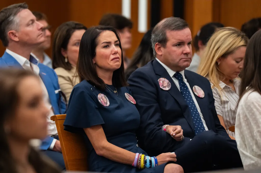 Jennifer Getten, crying, and Doug Getten attend a court hearing, both wearing pins with a young girl's photo on them.