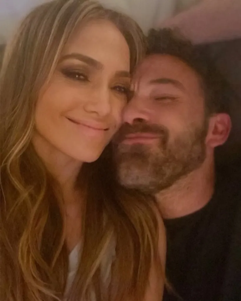 Jennifer Lopez and Ben Affleck embracing.