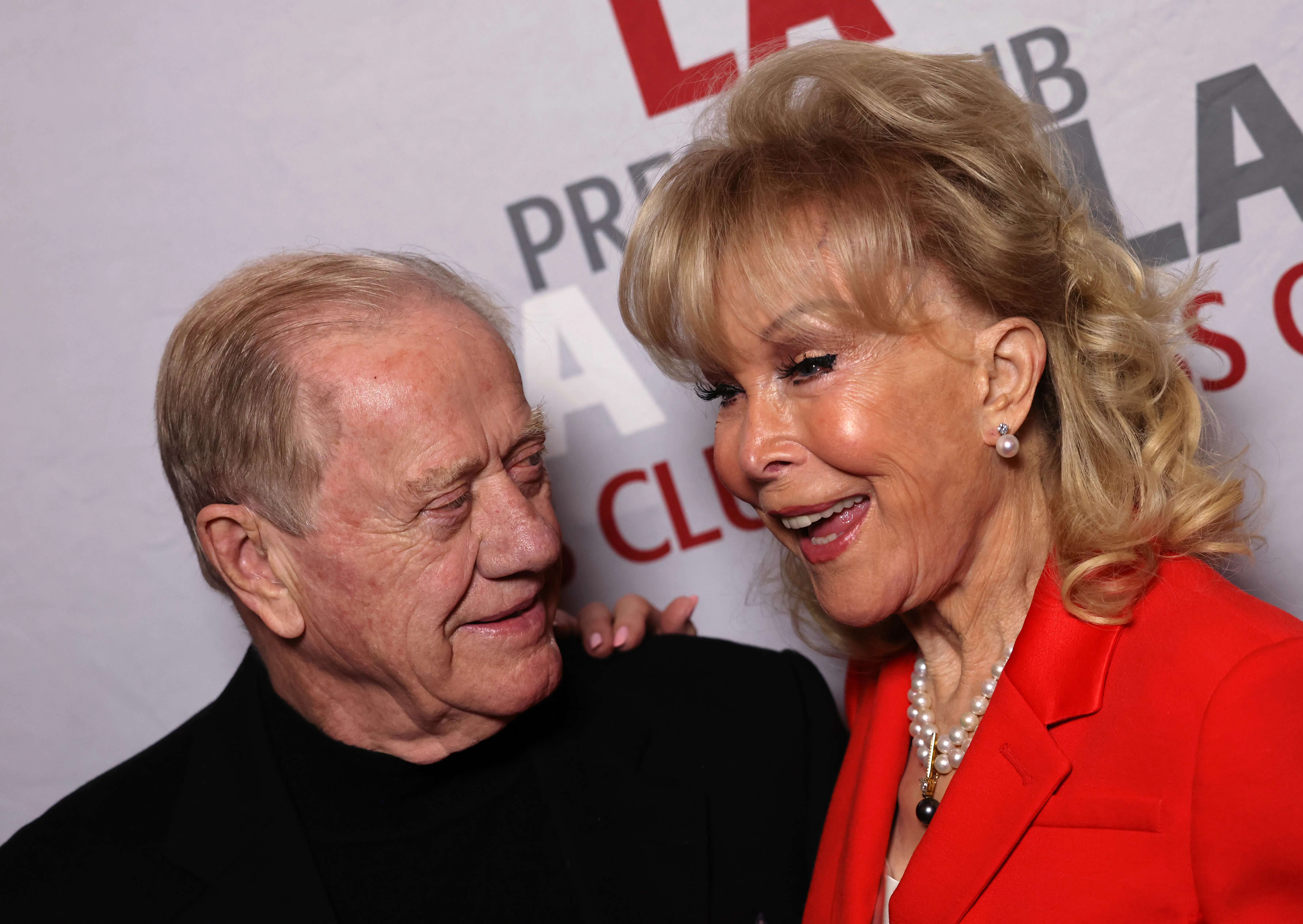 Barbara Eden and Jon Eicholtz smiling together.