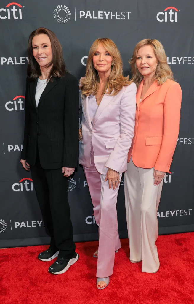 Kate Jackson, Jaclyn Smith, and Cheryl Ladd pose on the red carpet at the 