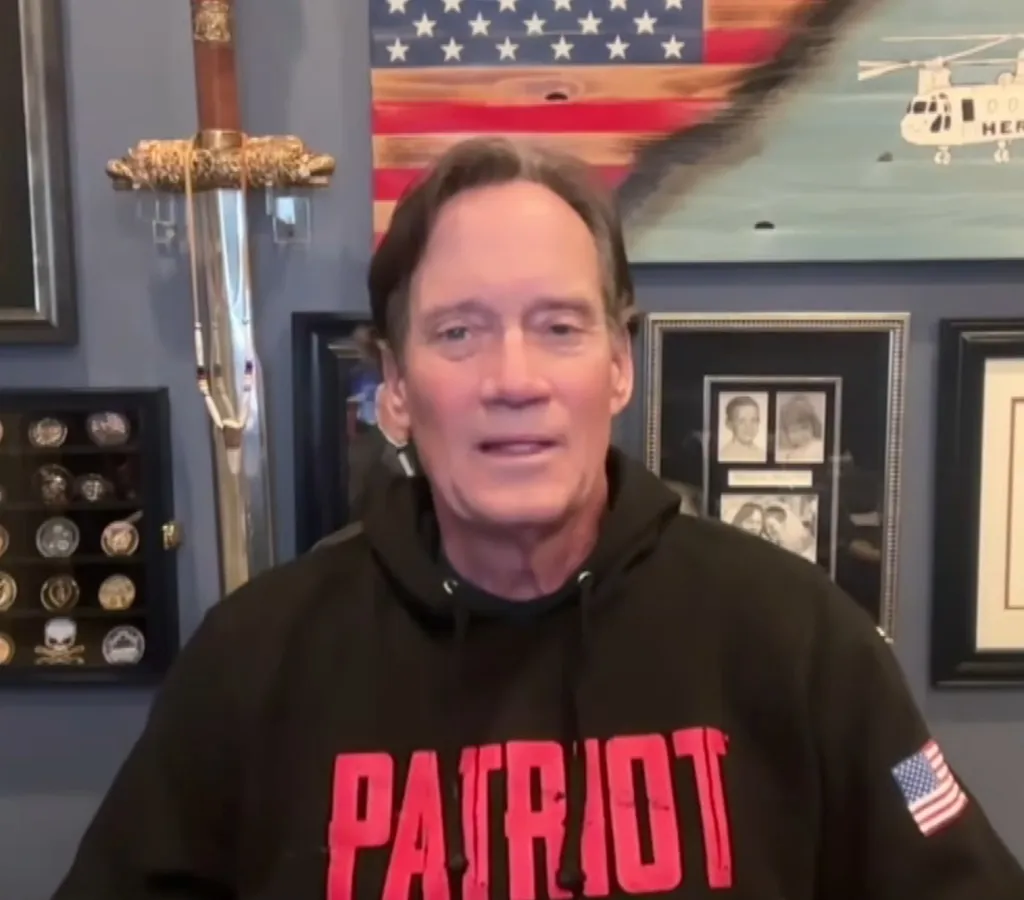 Kevin Sorbo wearing a "PATRIOT" hoodie.