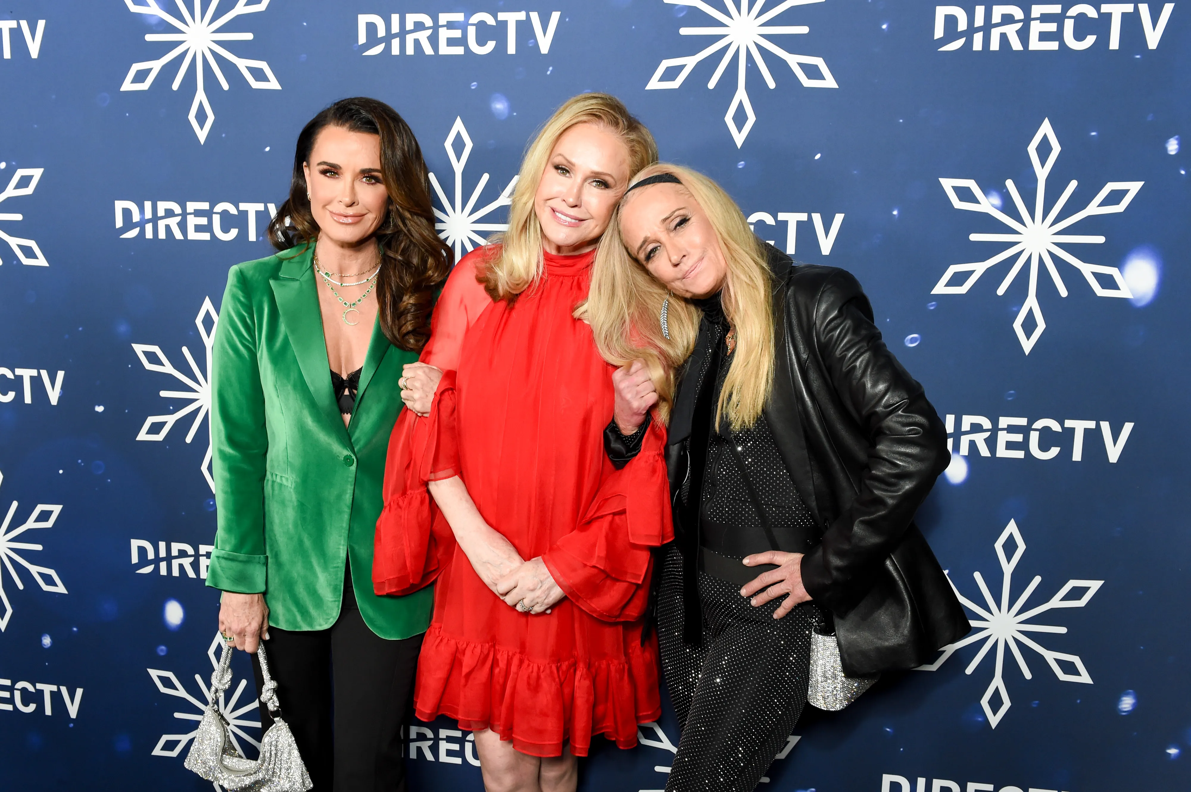 Kyle Richards, Kathy Hilton, and Kim Richards posing at 
