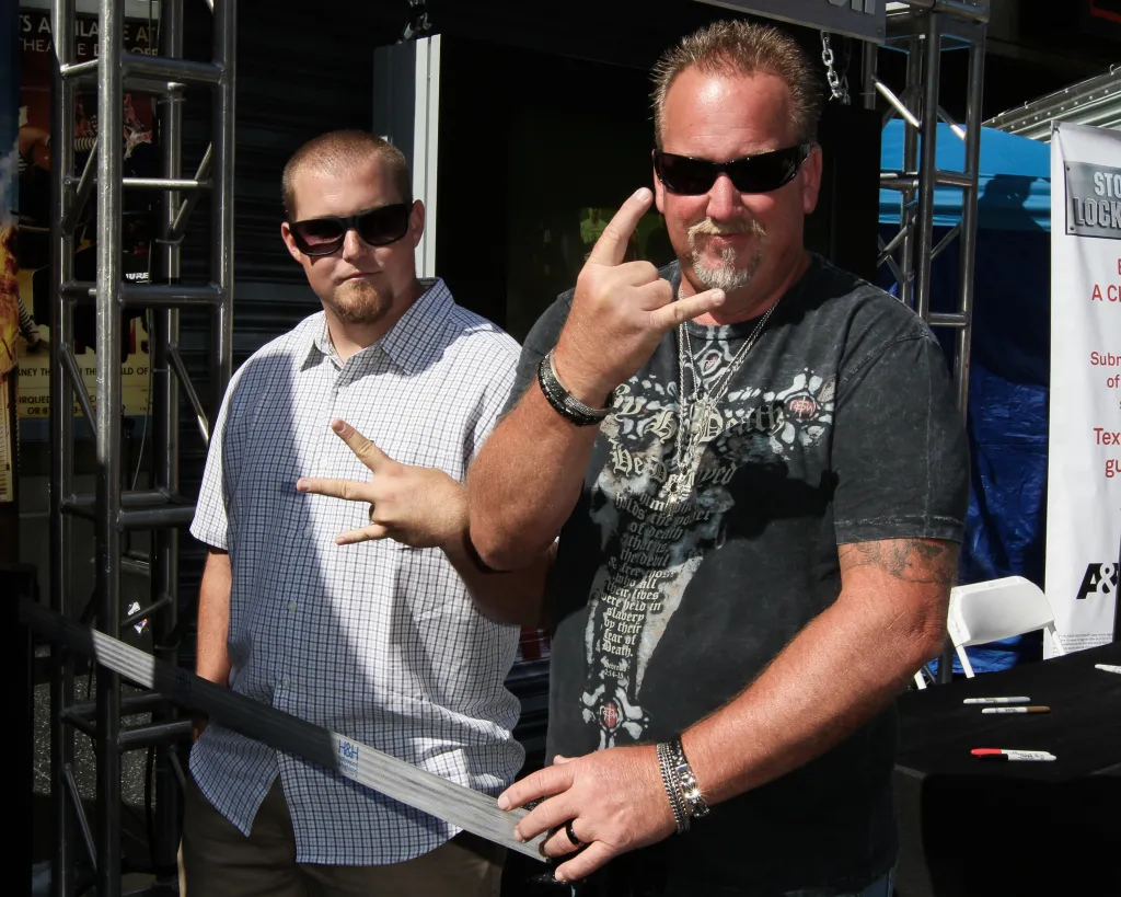 Darrell Sheets and Brandon Sheets from "Storage Wars" posing for a photo.