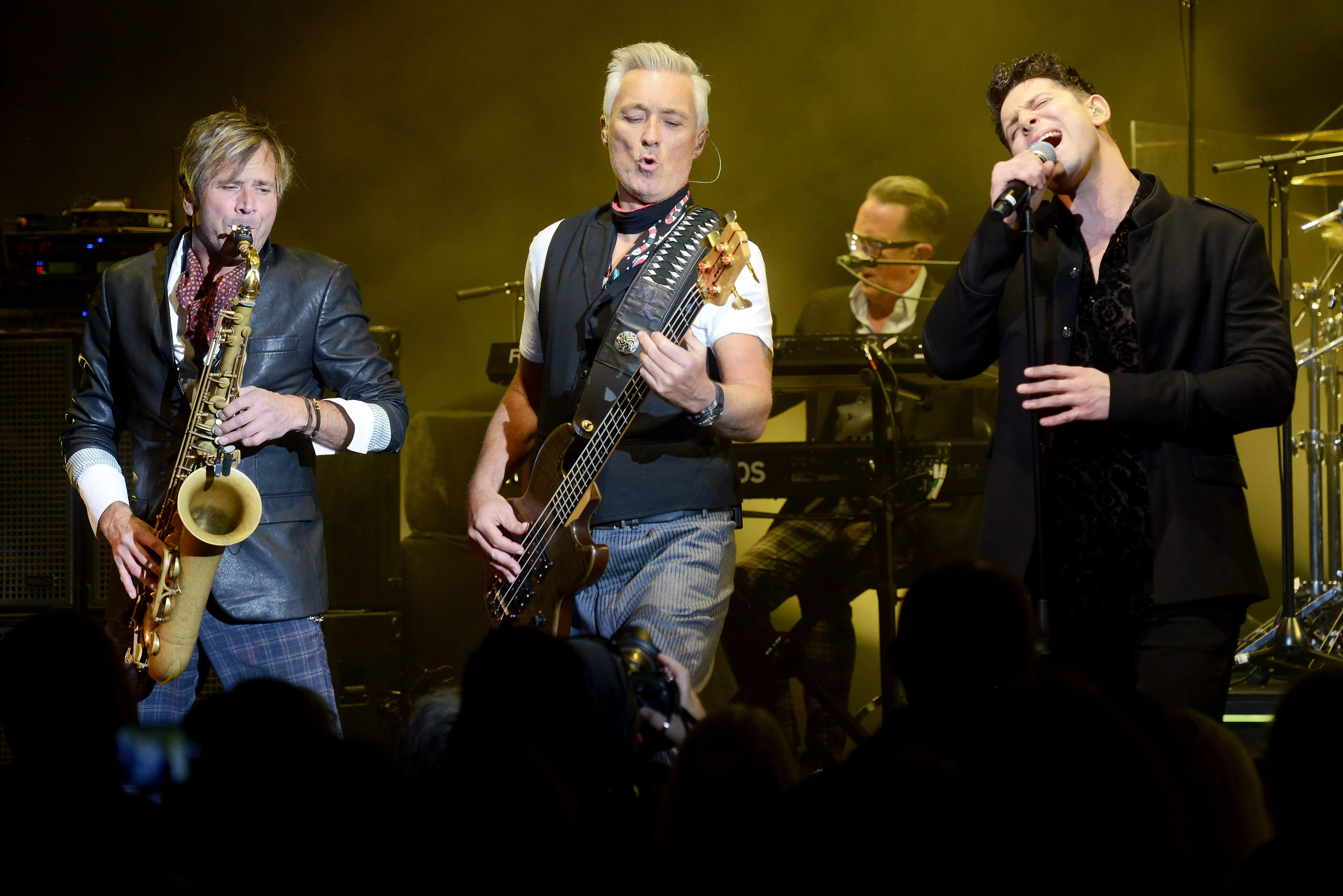 (L-R) Steve Norman, Martin Kemp and Ross William Wild of Spandau Ballet perform on stage at Eventim Apollo on October 29, 2018 in London, England.