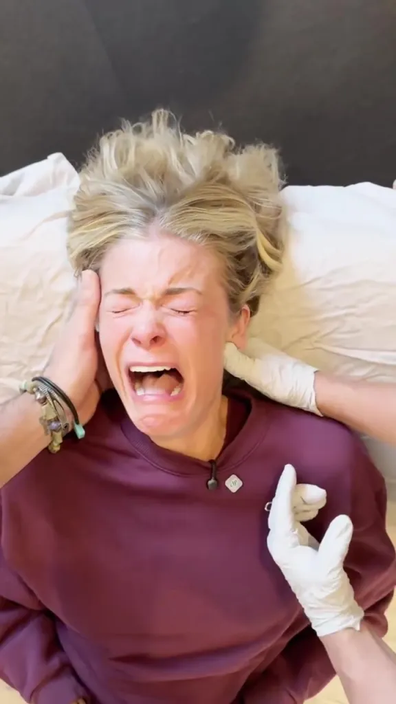 LeAnn Rimes crying while undergoing "deep jaw release therapy."