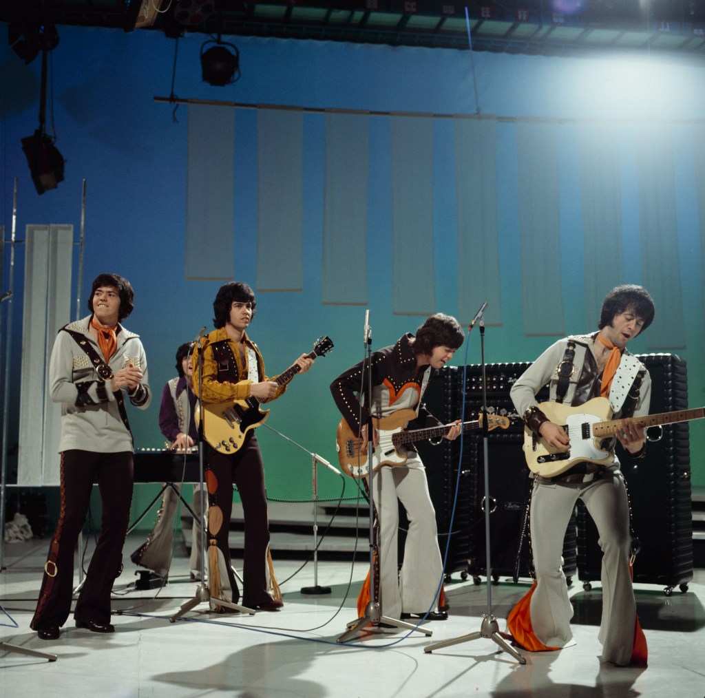 The Osmonds perform on a television show.