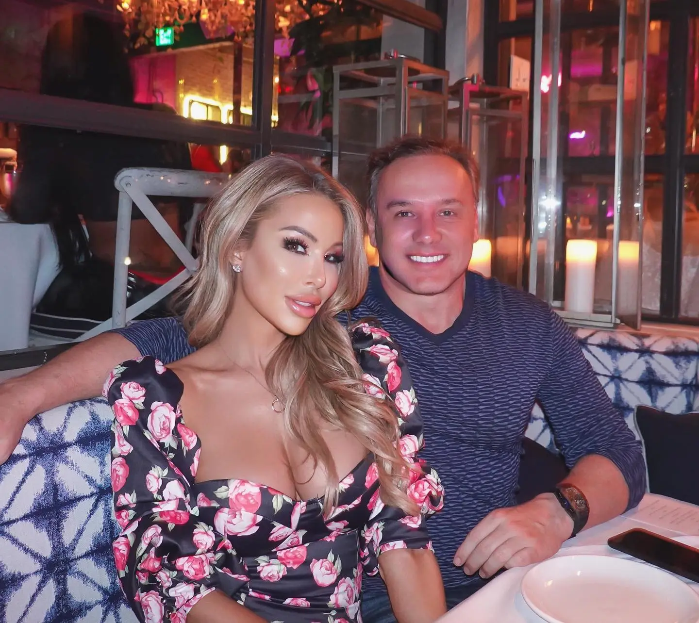 Lisa Hochstein with a man at a restaurant.