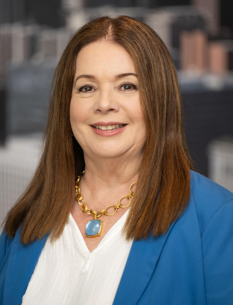 Los Angeles City Attorney Hydee Feldstein Soto looks forward in a headshot against a blurred grey background.
