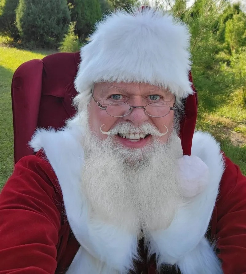 Thomas Hicks in a Santa Claus costume.