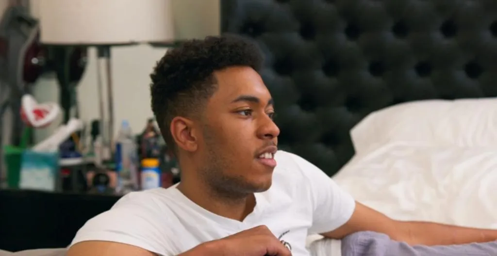 Mary Cosby's son, Robert Jr., talking in a bedroom.
