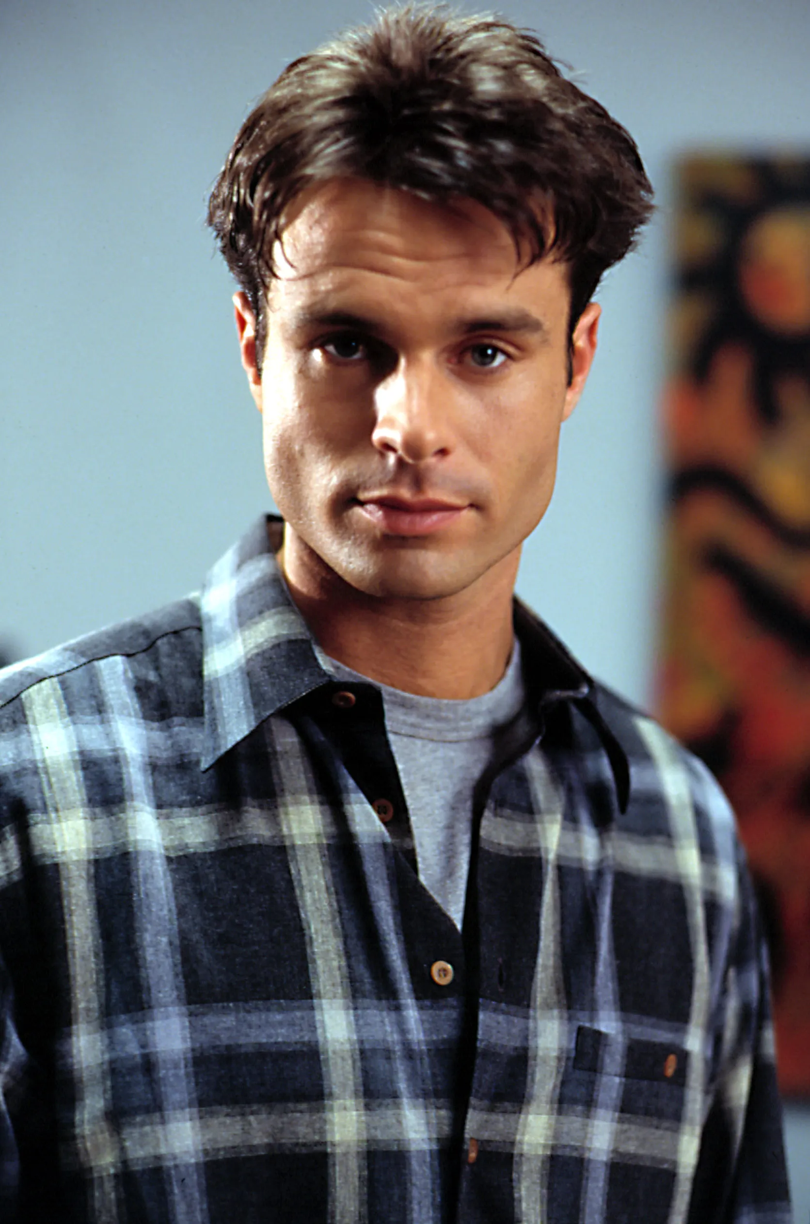 Patrick Muldoon wearing a flannel shirt.