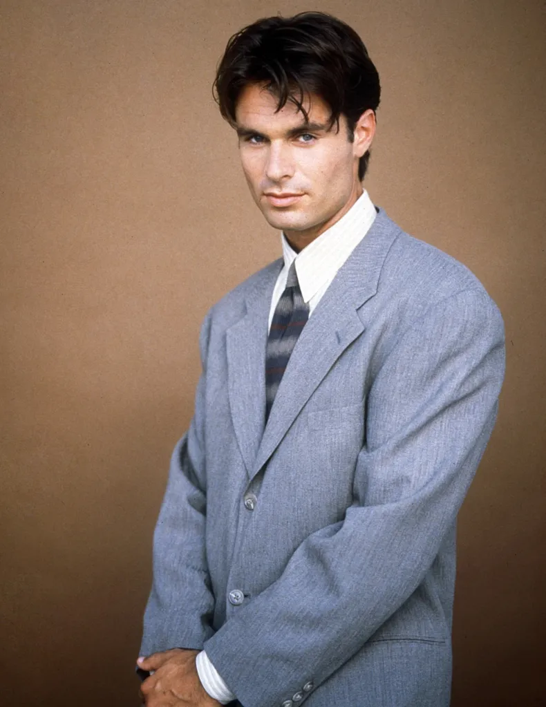 Portrait of Patrick Muldoon in a gray suit and patterned tie.