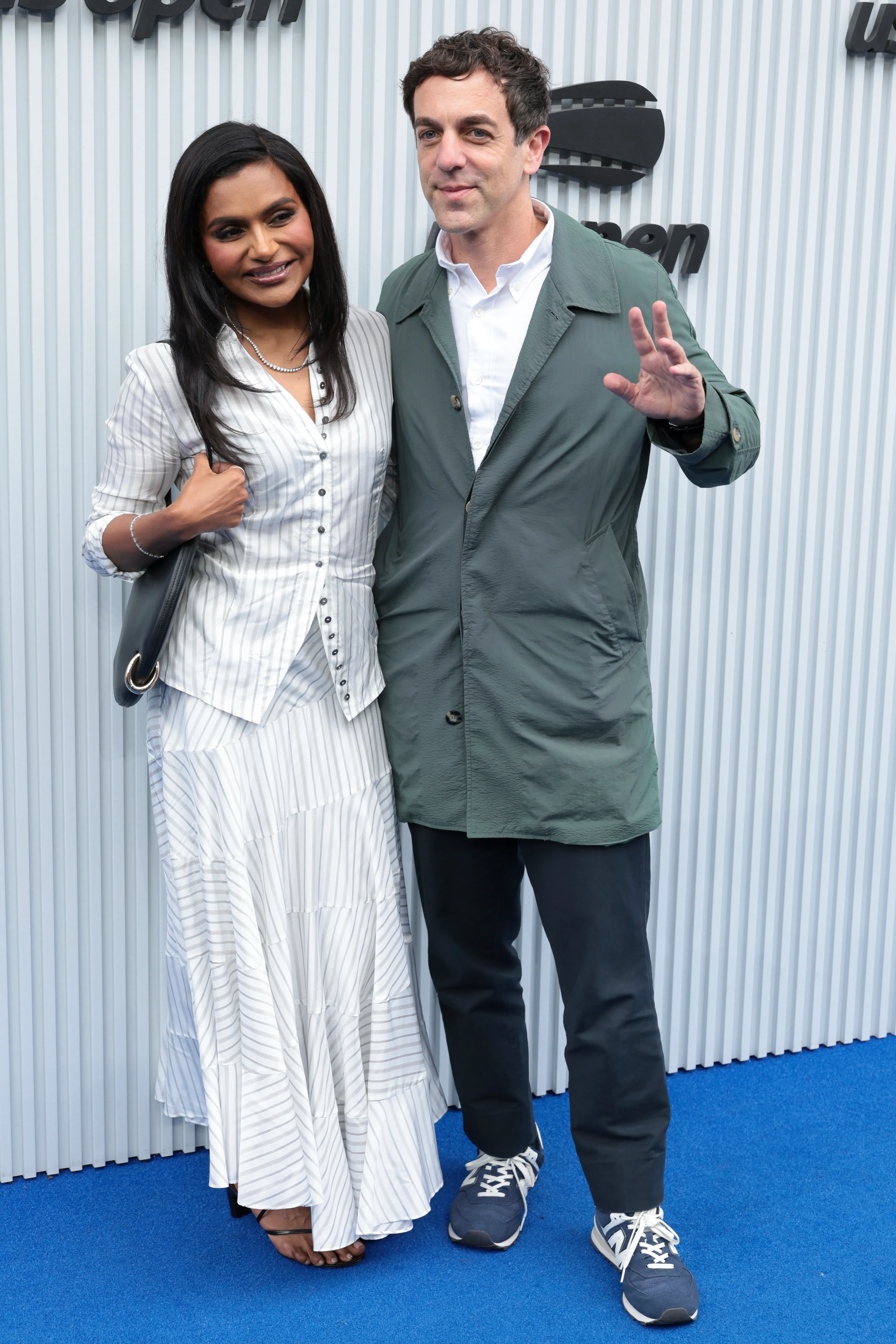 Mindy Kaling and B.J. Novak posing at the 2025 US Open Tennis Championships.