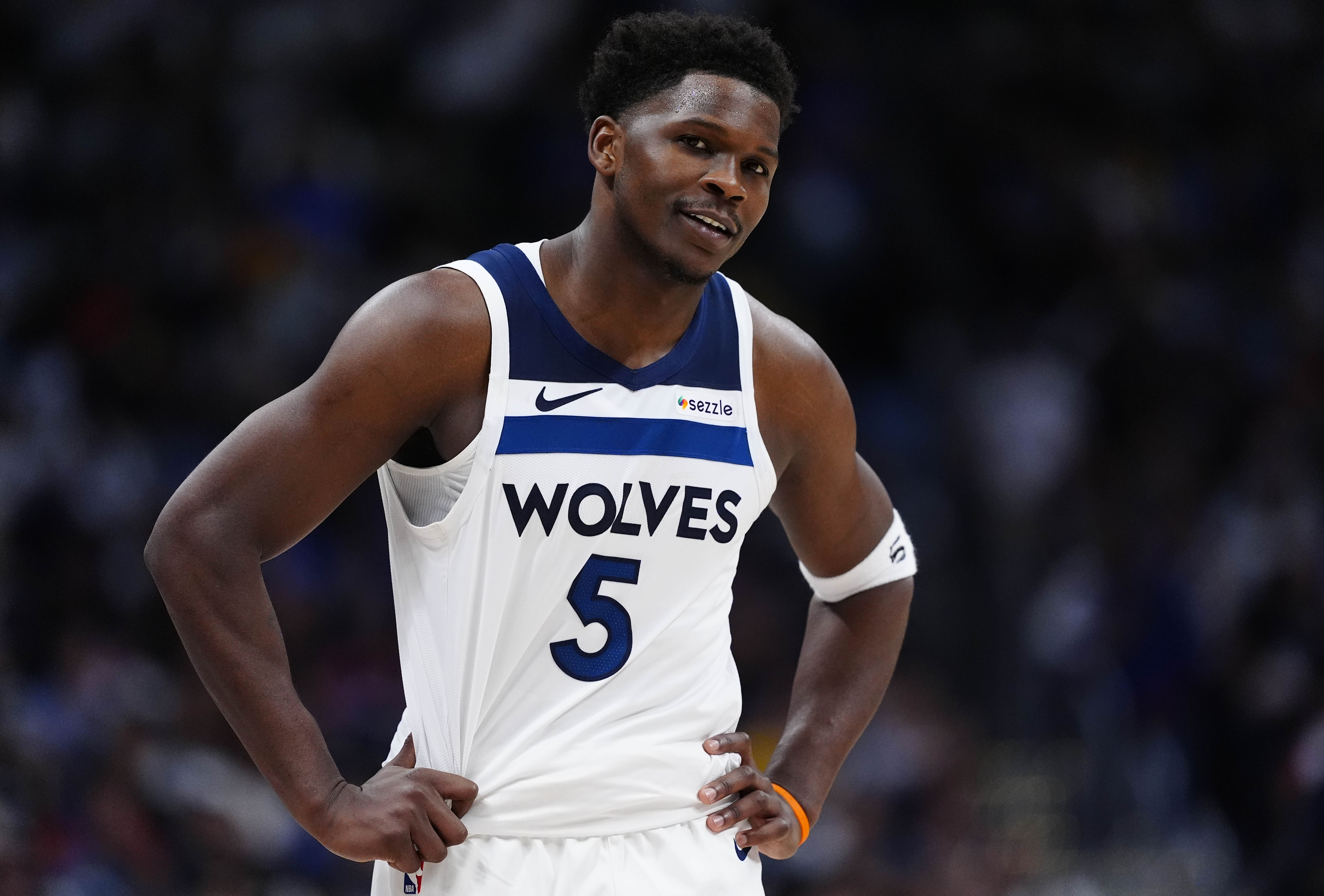 Minnesota Timberwolves guard Anthony Edwards (5) reacts during a game against the Denver Nuggets.