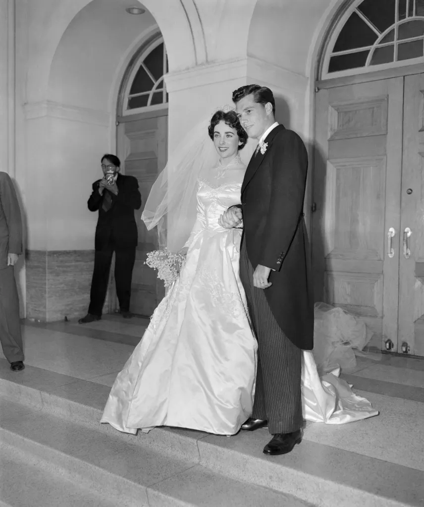 Elizabeth Taylor and Conrad Hilton Jr. on their wedding day at the Church of the Good Shepherd.