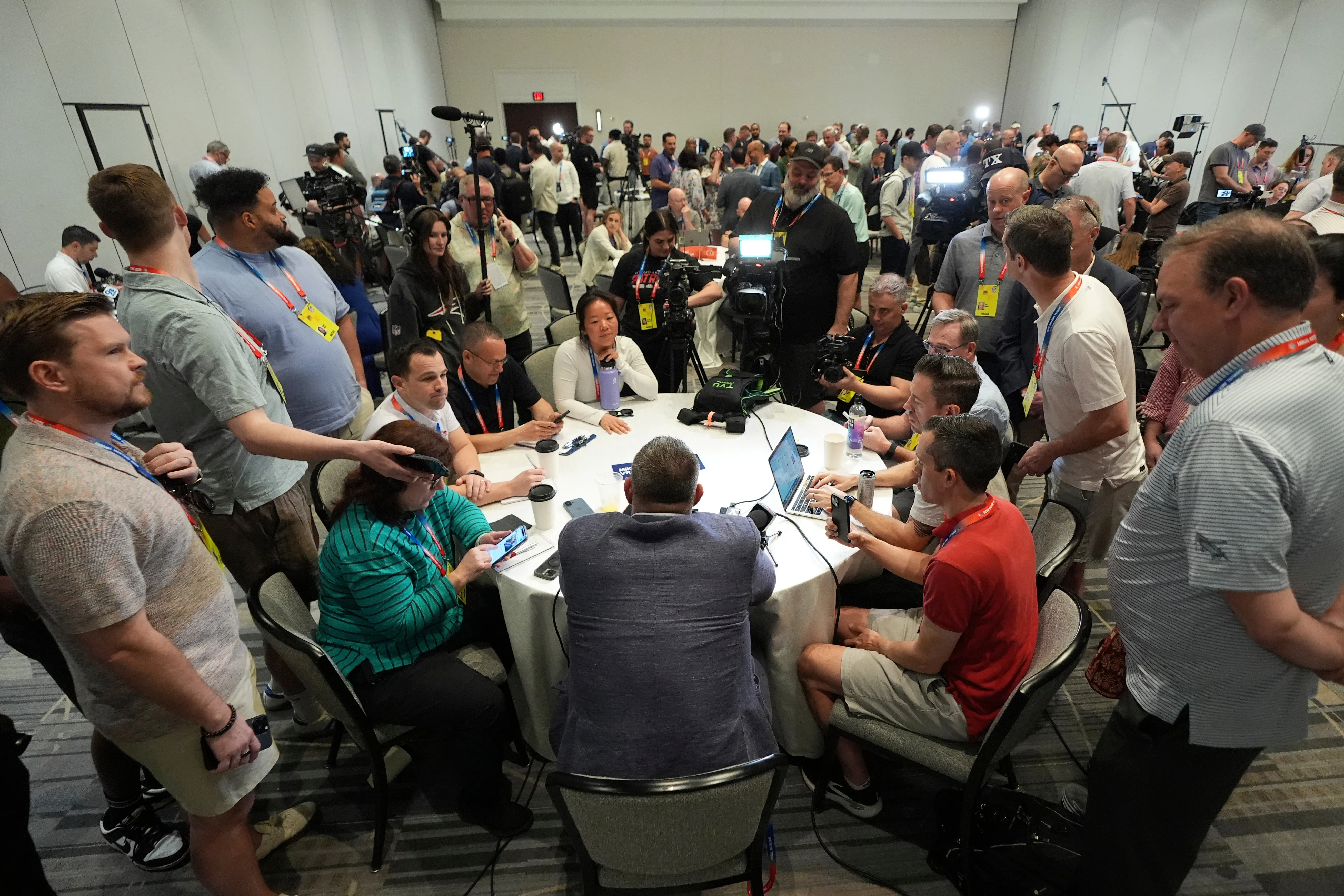 Mike Vrabel speaks with reporters