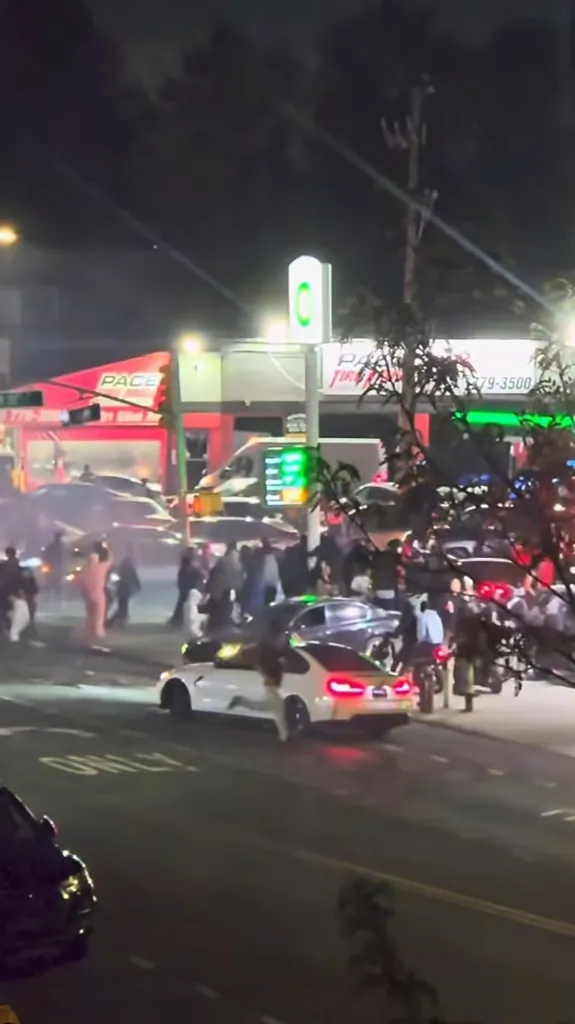 Car takeover at the intersection of 69th Street and Eliot Avenue in New York City.