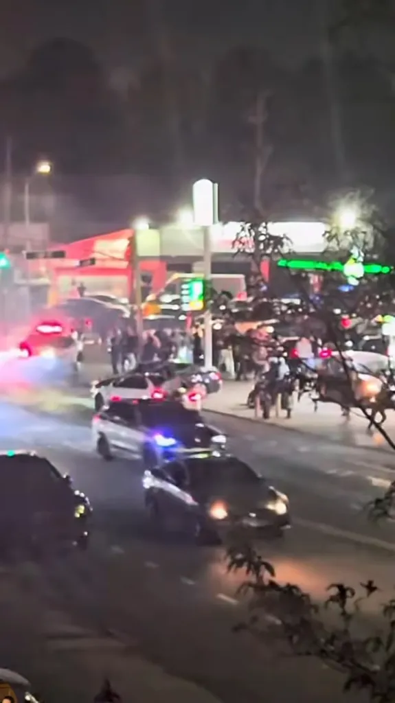 A car takeover event at 69th Street and Eliot Avenue in New York City.