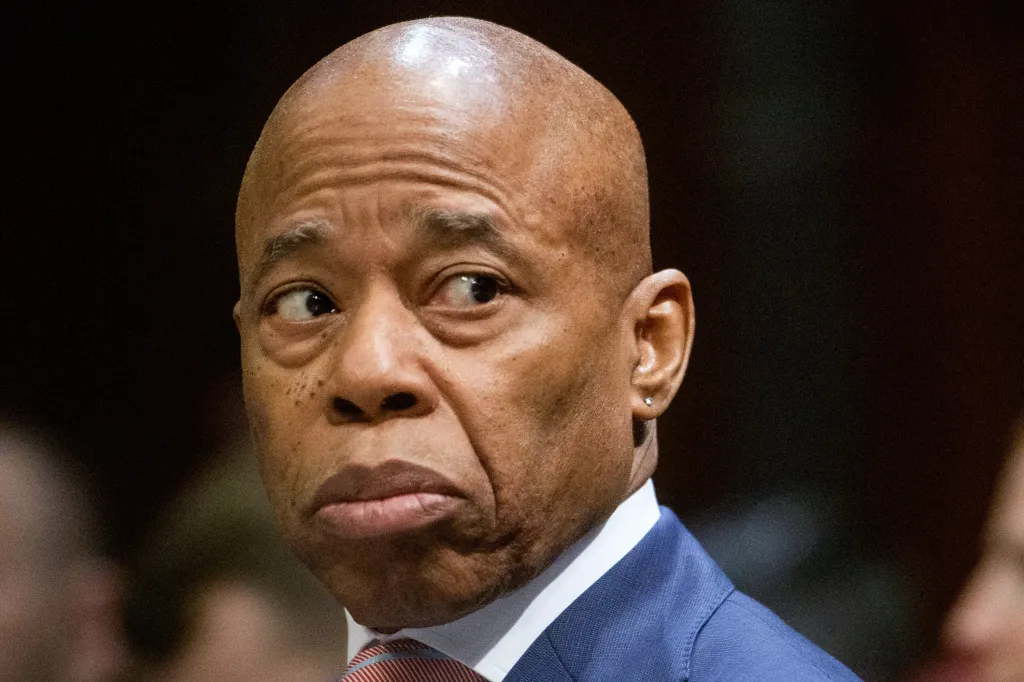 New York City Mayor Eric Adams looking sideways during a House Committee hearing.