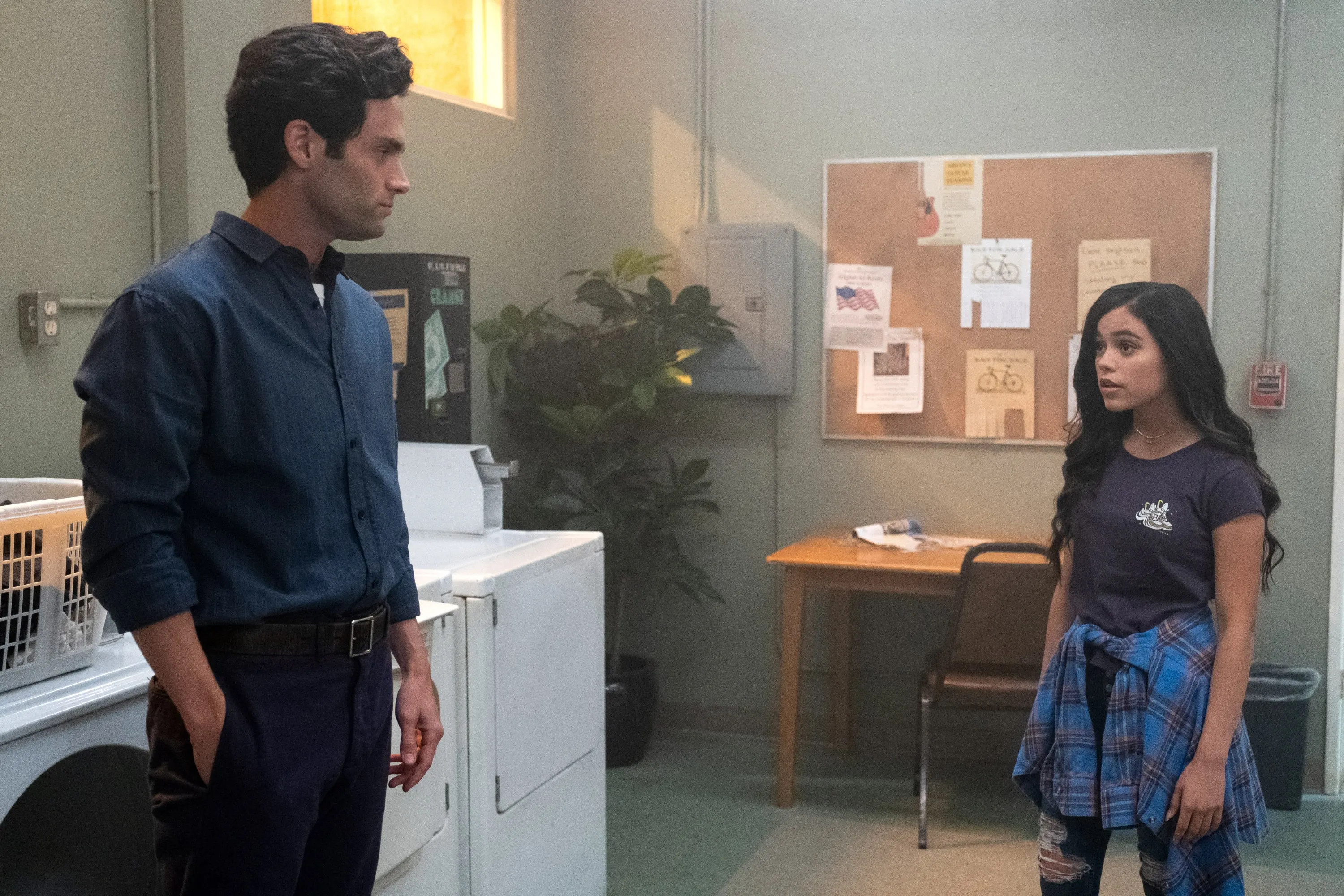 Penn Badgley and Jenna Ortega in "You"