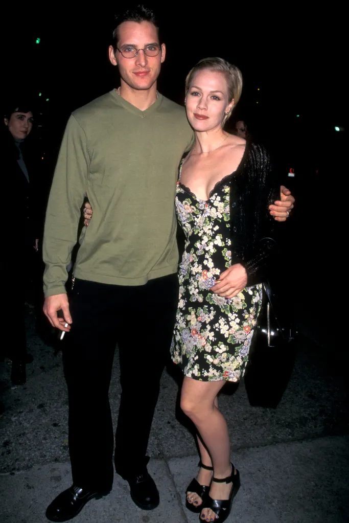 Peter Facinelli and Jennie Garth posing together at the premiere of "Telling You."