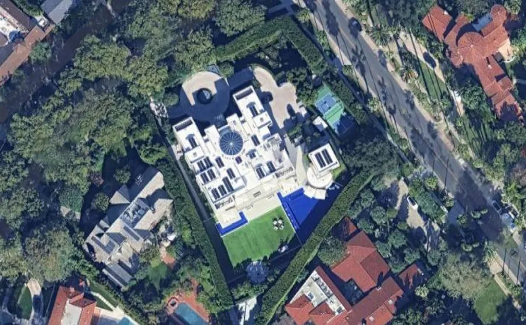 Aerial view of Stephen Cloobeck's white luxury home in Beverly Hills.