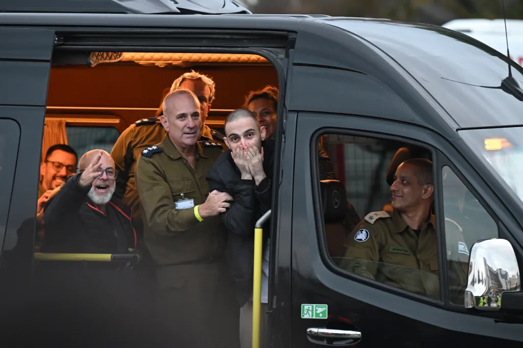 Omer Wenkert reacting from inside a van after being released by Hamas.