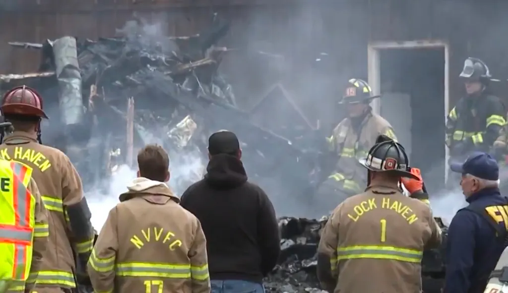 First responders and firefighters at the scene of a fire and explosion in Lamar Township near Mill Hall, Pennsylvania.