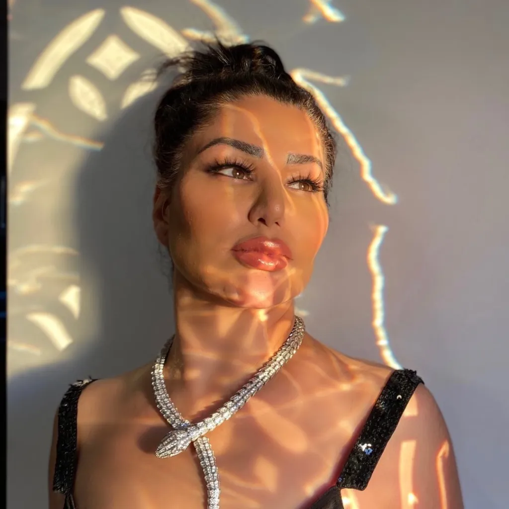 Hamideh Soleimani Afshar, niece of Qasem Soleimani, wearing a snake necklace.