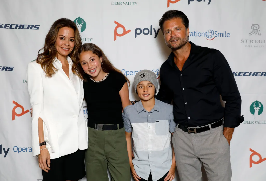 Brooke Burke, David Charvet, Heaven Rain Charvet, and Shaya Charvet pose at Operation Smile's 8th Annual Park City Ski Challenge.