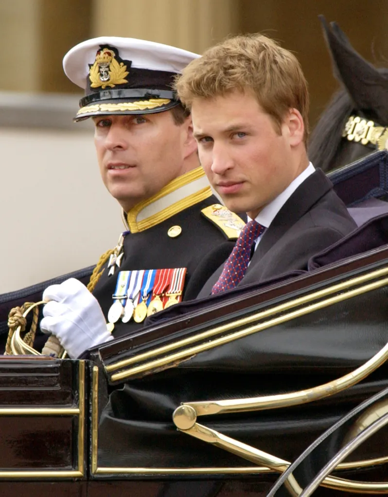 Prince Andrew in uniform and Prince William in a suit riding in an open carriage.