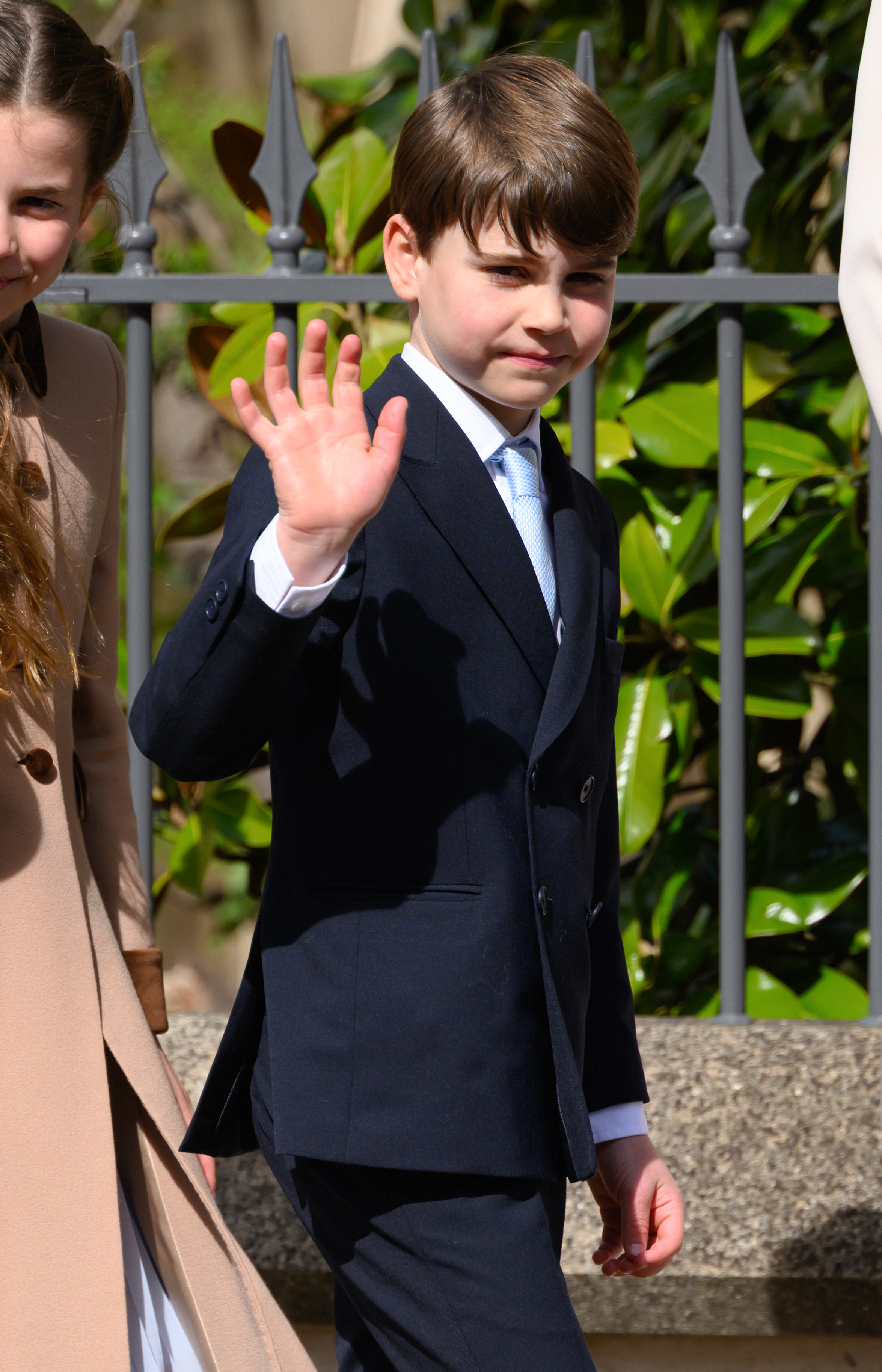 Prince Louis of Wales waves goodbye while departing the 2026 Easter Matins Service.